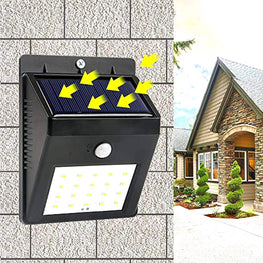 Black solar security LED light for outdoor use.